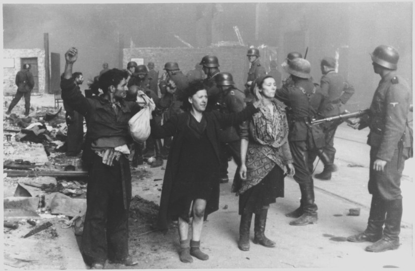 Jews held at gunpoint by Nazis during the Warsaw Ghetto Uprising.