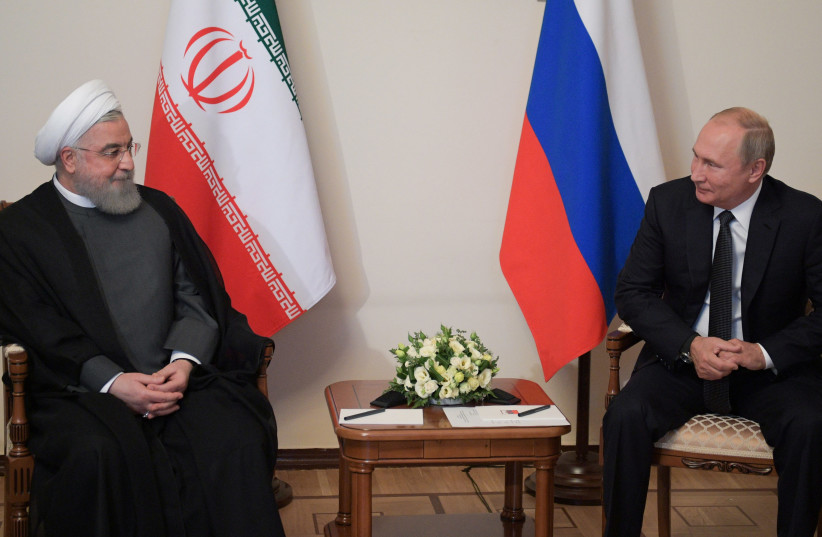 Russian President Vladimir Putin meets with Iranian President Hassan Rouhani on the sidelines of a session of the Supreme Eurasian Economic Council In Yerevan, Armenia October 1, 2019 (credit: SPUTNIK/ALEXEI DRUZHININ/KREMLIN VIA REUTERS)