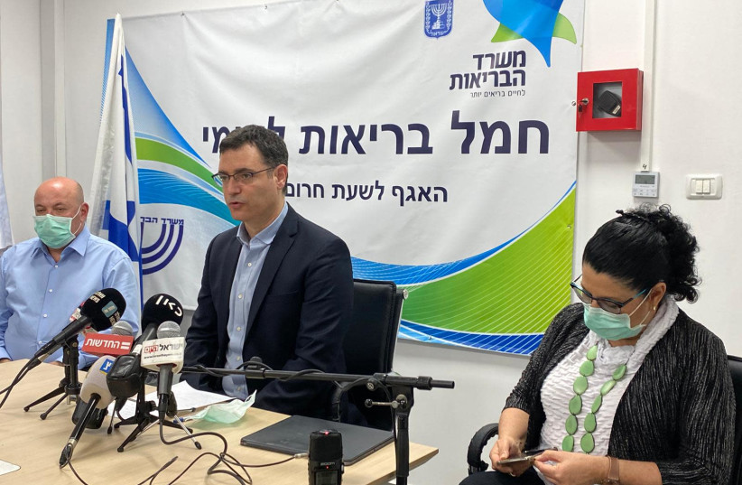 Outgoing Health Ministry director-general Moshe Bar Siman Tov at a press conference on May 29 (credit: Courtesy)