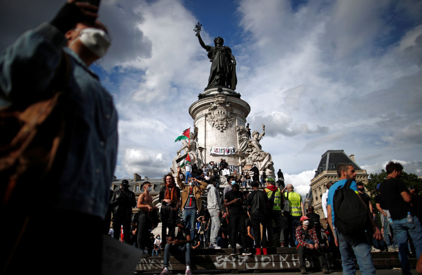 Demonstrators attend a protest at the Place de la Republique square in Paris, France June 13, 2020. (photo credit: BENOIT TESSIER/REUTERS)