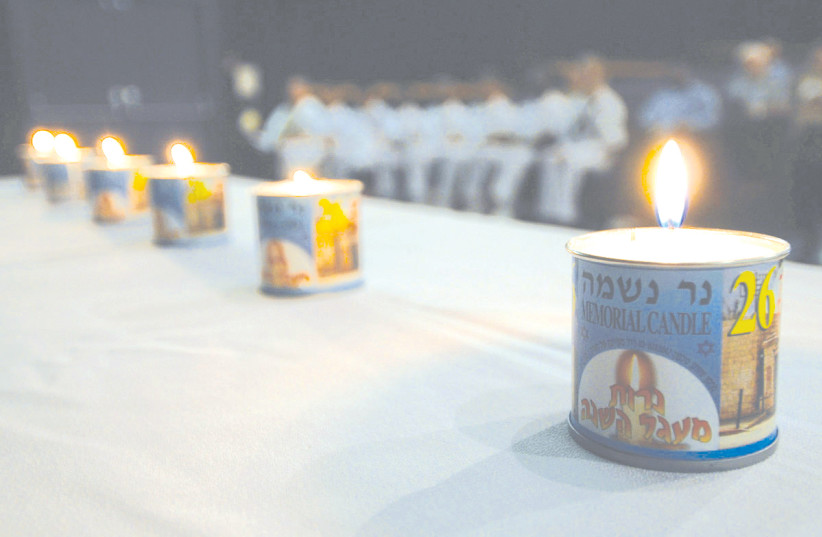 Jewish memorial candles (illustrative) (credit: WIKIPEDIA)