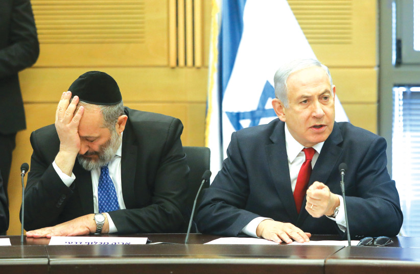 Prime Minister Benjamin Netanyahu and Shas chairman Aryeh Deri. (photo credit: MARC ISRAEL SELLEM/THE JERUSALEM POST)