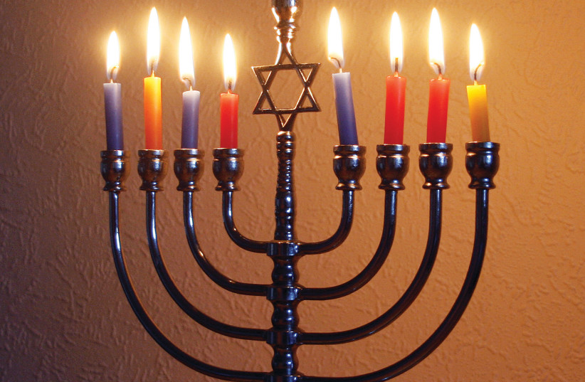A Hanukkah menorah. (credit: Wikimedia Commons)