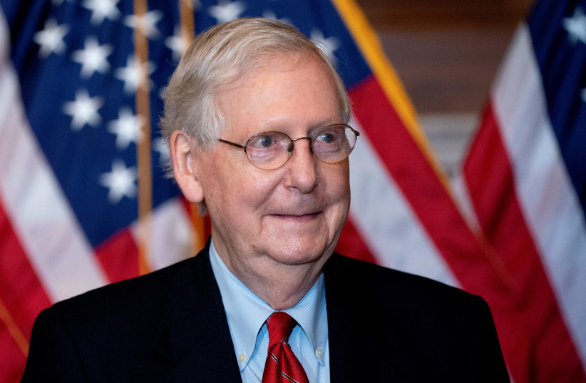 US Senate Majority Leader Mitch McConnell, a Republican from Kentucky, stands for a photo at the US Capitol in Washington, DC, US, November 9, 2020.  (credit: STEFANI REYNOLDS/POOL VIA REUTERS)