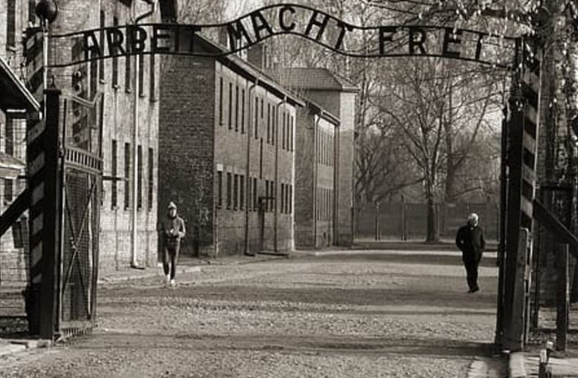 The main gate to Auschwitz with slogan 'Arbeit Macht Frei' (credit: PIKREPO)