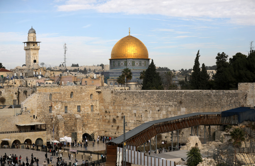 A general view of Jerusalem's Old City shows the Western Wall, Judaism's holiest site, in the foreground as the Dome of the Rock, located on the compound known to Muslims as Noble Sanctuary and to Jews as Temple Mount, is seen in the background. (photo credit: REUTERS/AMMAR AWAD)