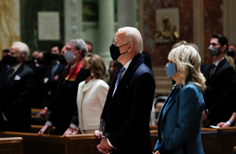 President-elect Joe Biden and his wife Jill Biden attend a church service before his presidential inauguration, at St. Matthews Catholic Church in Washington, U.S., January 20, 2021. (photo credit: TOM BRENNER/REUTERS)