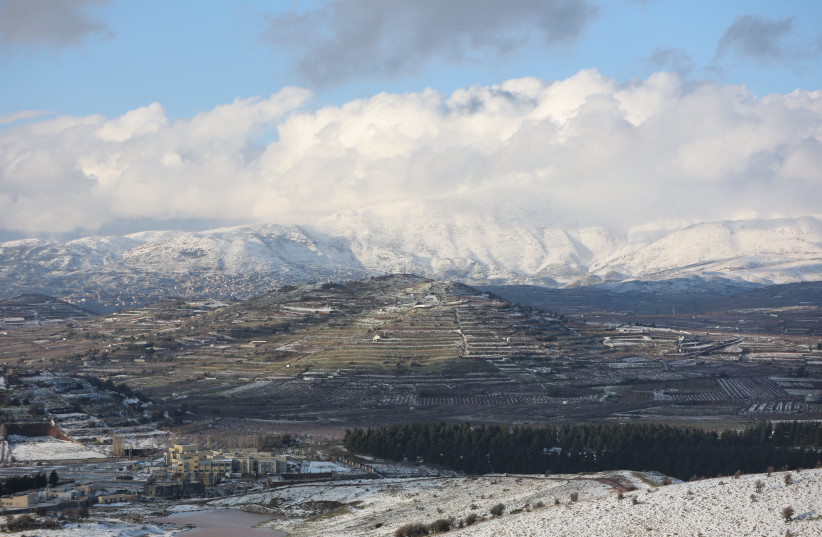View of Mount Hermon covered with snow as it seen from the northern Golan Heights, near the border with Syria, January 20, 2021. (credit: MAOR KINSBURSKY/FLASH90)