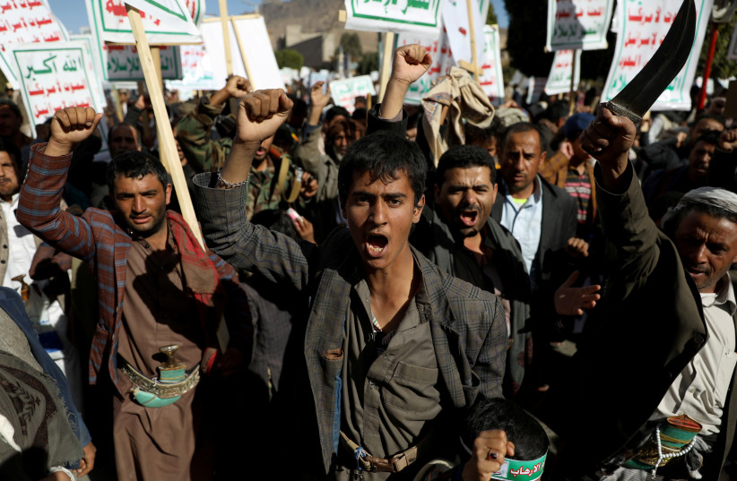 Houthi supporters shout slogans during a rally against the United States' designation of Houthis as a foreign terrorist organization, in Sanaa, Yemen January 25, 2021