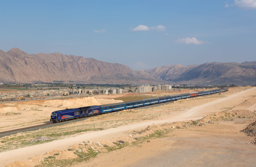 Siemens ER24PC 1637 "IranRunner" of the Islamic Republic of Iran Railways with the night train from Shiraz to Tehran outside of Shiraz, Iran (photo credit: KABELLEGER/DAVID GUBLER/WIKIMEDIA COMMONS)