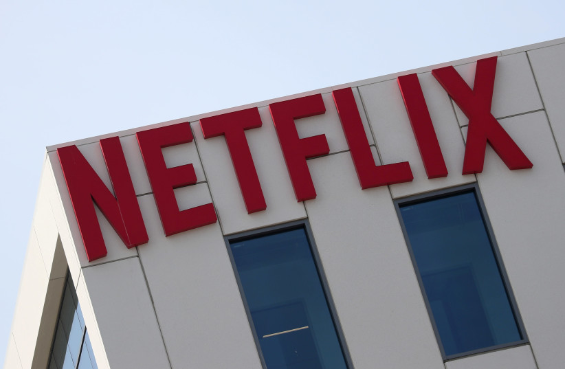The Netflix logo is seen on their office in Hollywood, Los Angeles, California, US July 16, 2018.  (credit: REUTERS/LUCY NICHOLSON/FILE PHOTO)