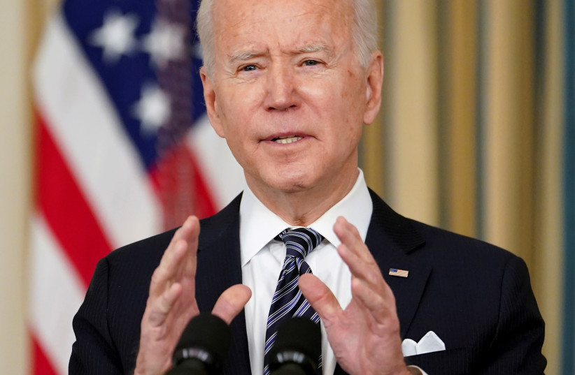 US President Joe Biden speaks in the State Dining Room at the White House in Washington, US, March 15, 2021 (photo credit: REUTERS/KEVIN LAMARQUE/FILE PHOTO)