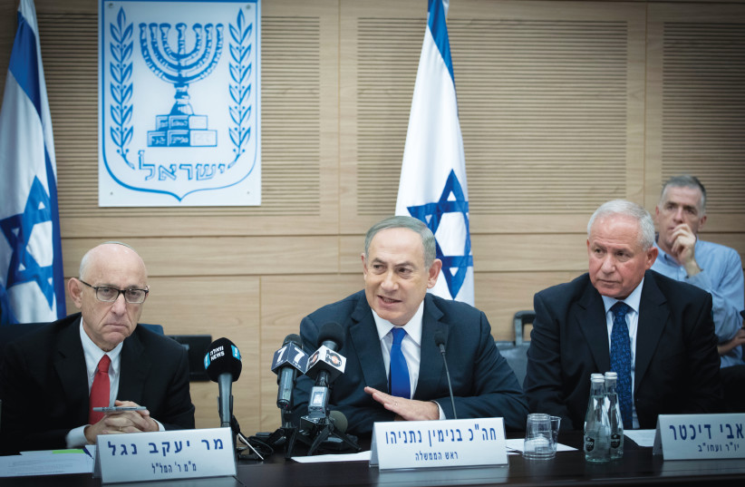 (From left) WRITER JACOB NAGEL, then national security adviser, with Prime Minister Benjamin Netanyahu and Foreign Affairs and Defense Committee head Avi Dichter at a 2017 meeting in the Knesset. ( (photo credit: YONATAN SINDEL/FLASH 90)