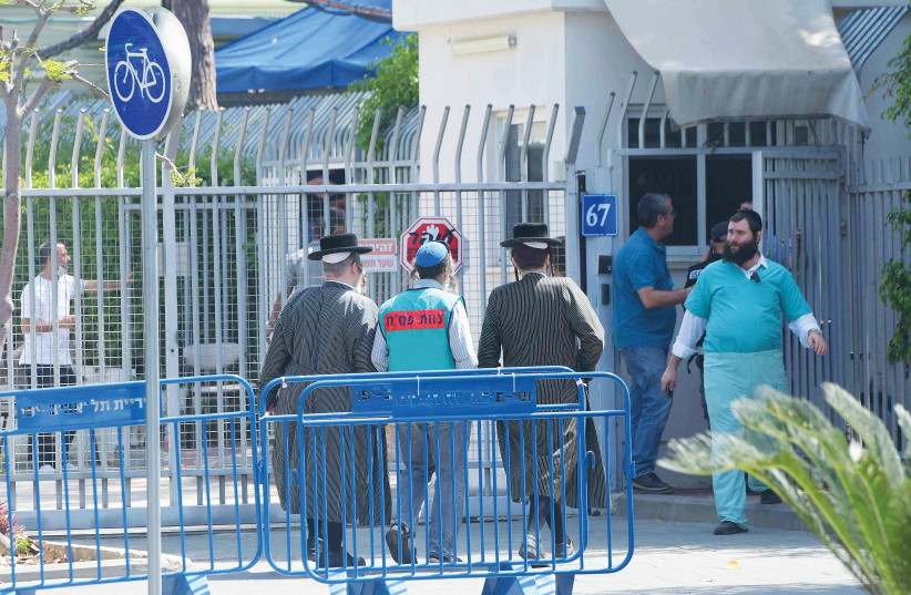 NEXT OF KIN of the victims of last week’s tragedy at Mount Meron arrive at the Abu Kabir Forensic Institute in Tel Aviv to identify the bodies of their loved ones. (credit: AVSHALOM SHOSHANI)