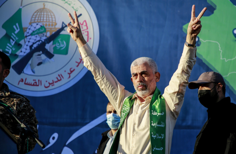 YAHYA SINWAR, leader of Hamas in Gaza, gestures on stage during a rally in Gaza City on May 24 (credit: ATIA MOHAMMED/FLASH90)