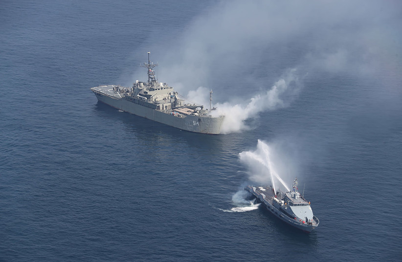 Iranian warships are seen during a joint naval exercise with Russian navy in the Indian Ocean, Iran February 16, 2021. Picture taken February 16, 2021. (credit: IRANIAN ARMY/WANA (WEST ASIA NEWS AGENCY) VIA REUTERS)