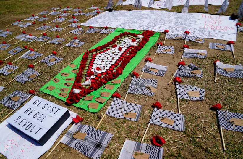 Pro-Palestine activists create a memorial to Palestinians killed in violence outside the White House in Washington on June 5 (credit: ERIN SCOTT/REUTERS)