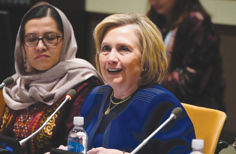 FORMER US secretary of state Hillary Clinton speaks about including women in the peace process in Afghanistan, at UN Headquarters in New York in March 2020. (photo credit: CARLO ALLEGRI/REUTERS)