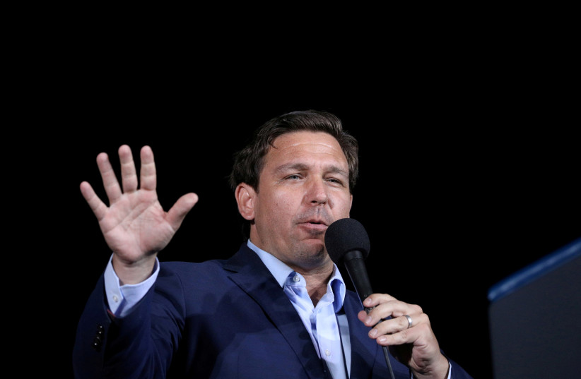 Florida Governor Ron Desantis speaks during a campaign rally by then US president Donald Trump at Pensacola International Airport in Pensacola, Florida, US, October 23, 2020. (credit: TOM BRENNER/REUTERS)