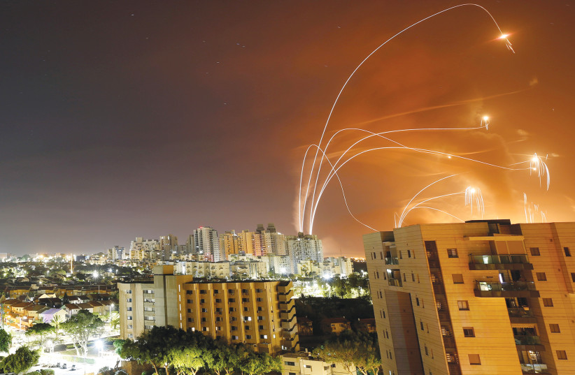 THE IRON Dome anti-missile system intercepts a rocket launched from the Gaza Strip toward Israel, as seen from Ashkelon last month.