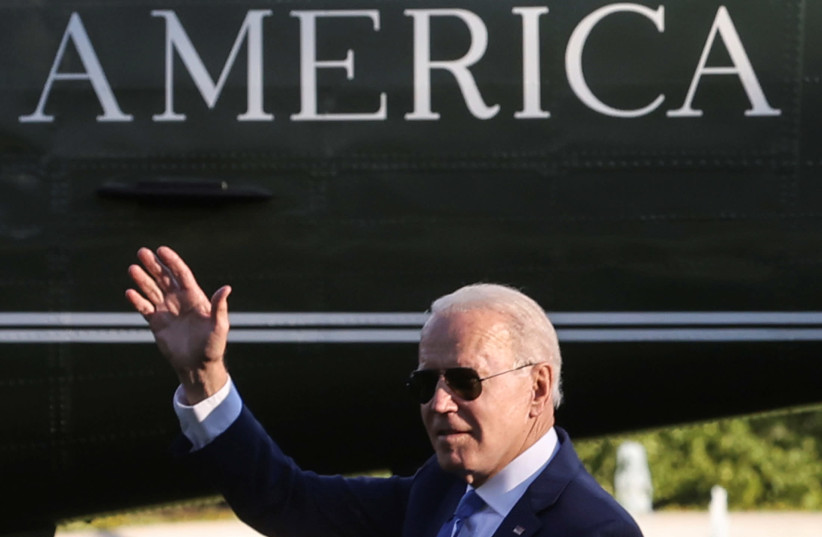 US President Joe Biden waves before boarding the Marine One helicopter to depart for Camp David from the White House in Washington, US June 25, 2021.  (credit: REUTERS/JONATHAN ERNST)