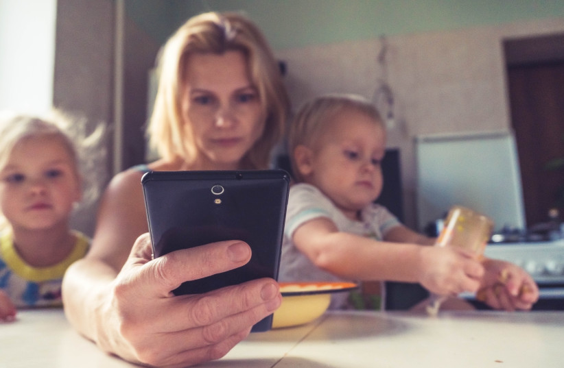 DOES EVERY working mother feel they need to be at work when they’re at home, and at home when they’re at work? (credit: VITOLDA KLEIN/UNSPLASH)