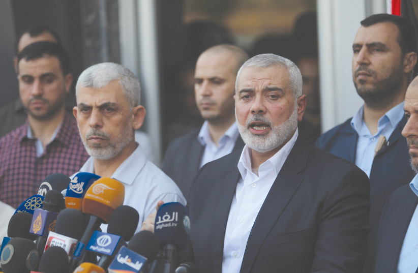 HAMAS CHIEF Ismail Haniyeh speaks to the press upon his arrival at the Rafah border crossing in the southern Gaza Strip in 2017. (credit: ABED RAHIM KHATIB/FLASH90)