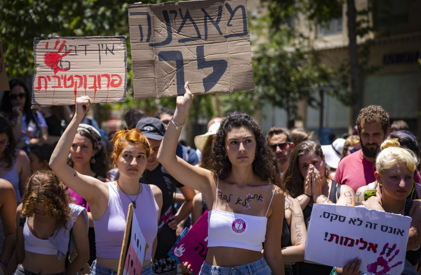 Israeli protesters chant slogans as they march in the SlutWalk in central Jerusalem, on June 18, 2021. (credit: PHOTO BY OLIVER FITOUSSI/FLASH90)