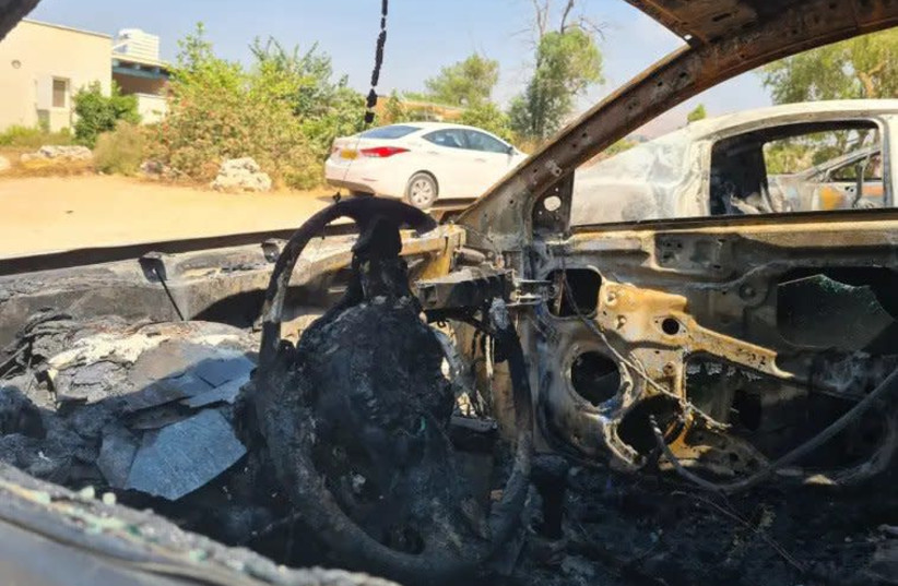 Vehicles torched at Vered Hagalil (credit: ELI ASHKENAZI/WALLA!)