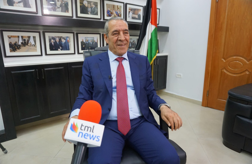 Palestinian Authority Civil Affairs Minister Hussein Al-Sheikh speaks to The Media Line in his office in Ramallah. (credit: THE MEDIA LINE)