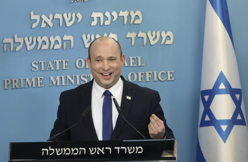 Prime Minister Naftali Bennett holds a news conference in Jerusalem on July 14.  (photo credit: MARC ISRAEL SELLEM)