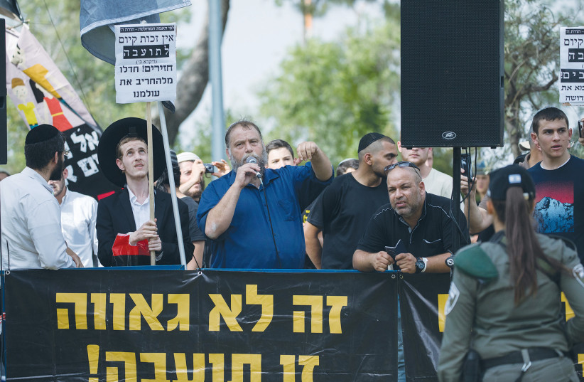  LEHAVA CHAIRMAN Benzi Gopstein and activists protest the annual Jerusalem Pride Parade under heavy security, in 2019. (credit: YONATAN SINDEL/FLASH90)