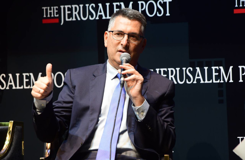 Minister Gideon Sa'ar is seen speaking at the Jerusalem Post annual conference at the Museum of Tolerance in Jerusalem, on October 12, 2021. (credit: AVSHALOM SASSONI/MAARIV)
