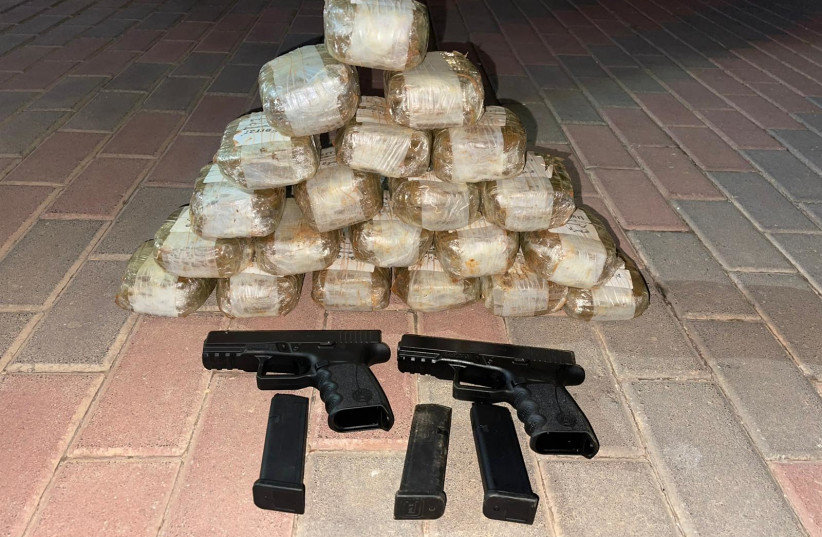  Drugs and weapons seized after a smuggling attempt across the Israel, Lebanon border. (credit: ISRAEL POLICE)