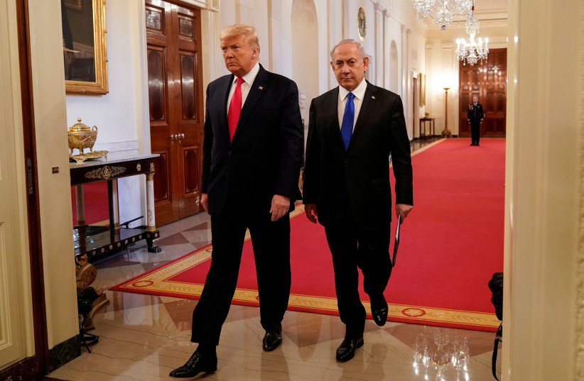  US President Donald Trump and Israel's Prime Minister Benjamin Netanyahu arrive to deliver joint remarks on a Middle East peace plan proposal in the East Room of the White House in Washington, US, January 28, 2020.  (credit: REUTERS/JOSHUA ROBERTS)