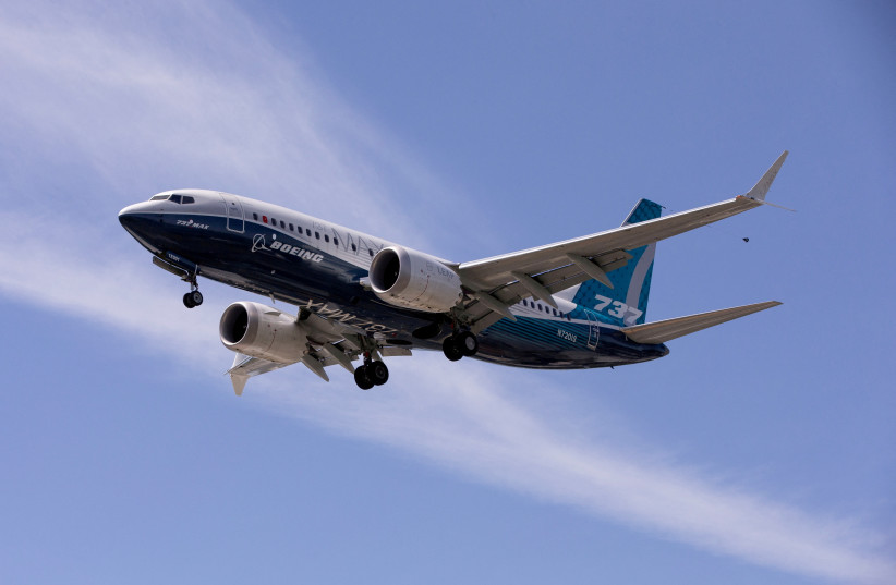  A Boeing 737 MAX airplane lands after a test flight at Boeing Field in Seattle, Washington, US June 29, 2020. (credit: REUTERS/KAREN DUCEY)
