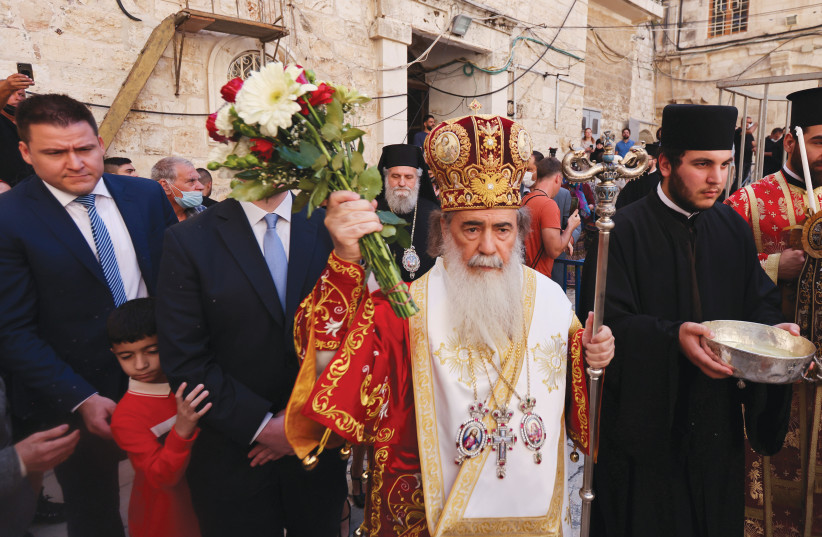  GREEK ORTHODOX Patriarch of Jerusalem Theophilos III leads the ‘Washing of the Feet’ ceremony outside the Church of the Holy Sepulchre in Jerusalem’s Old City in April 2022. (credit: RONEN ZVULUN/REUTERS)