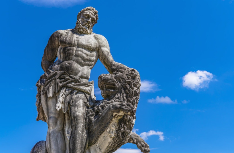  A statue of Hercules and a lion (photo credit: FELIX MITTERMEIER/PIXABAY)