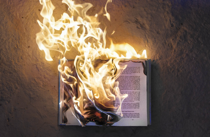  Burning books. (credit: Freddy Kearney/Unsplash)