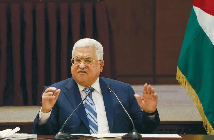 PALESTINIAN AUTHORITY leader Mahmoud Abbas addresses PA officials in Ramallah.