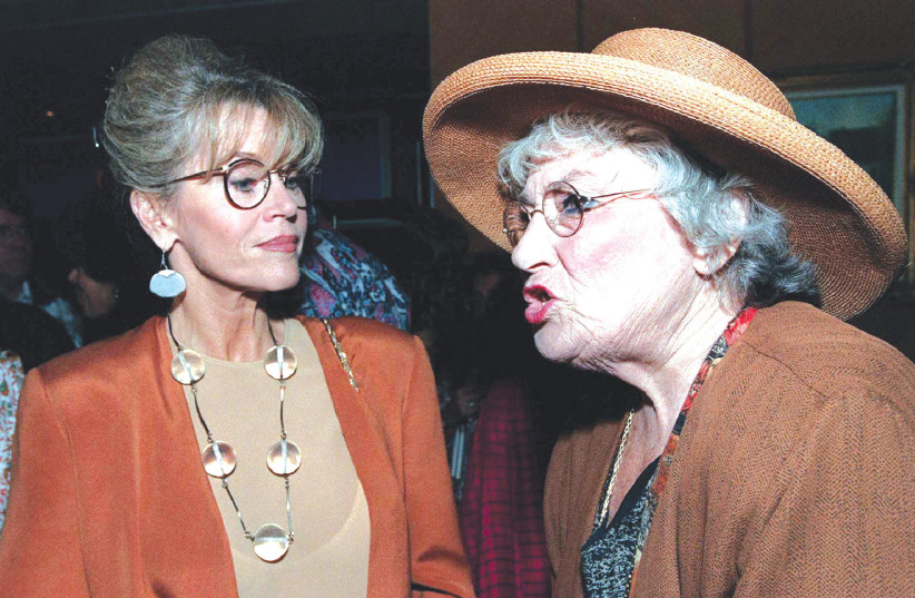  BELLA ABZUG wears her trademark large hat during a discussion with fellow activist Jane Fonda in 1995, at a function celebrating 20 years since the establishment of the United Nations Development Fund for Women (UNIFEM). (credit: REUTERS)