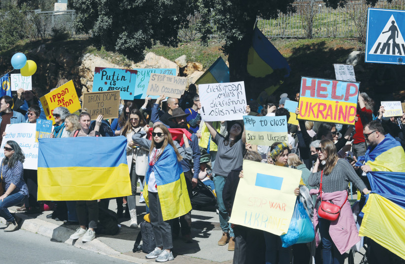  PEOPLE PARTICIPATE in a solidarity rally for Ukraine, outside the Knesset in Jerusalem. (credit: MARC ISRAEL SELLEM/THE JERUSALEM POST)