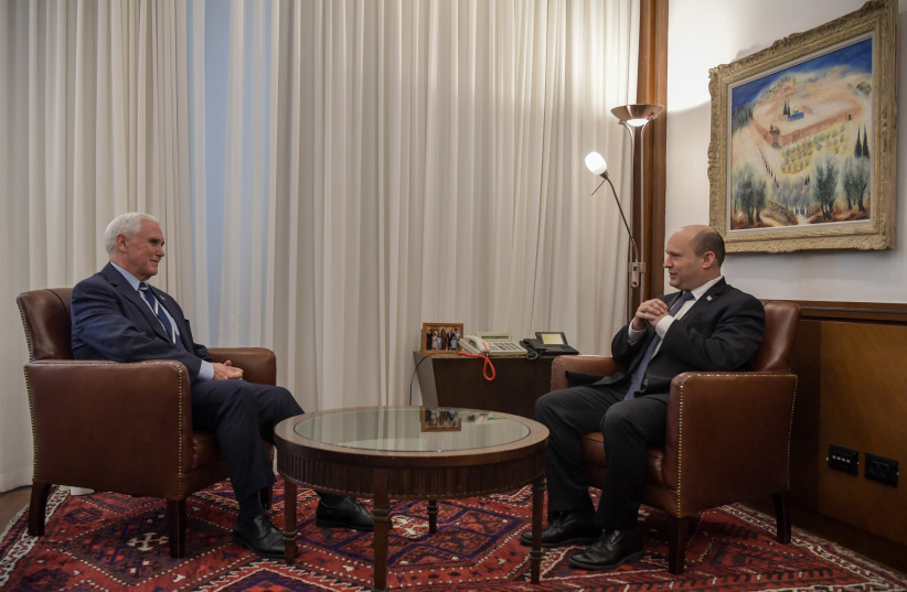 Prime Minister Naftali Bennett meets with former US vice president Mike Pence, March 8, 2022 (credit: KOBI GIDEON/GPO)