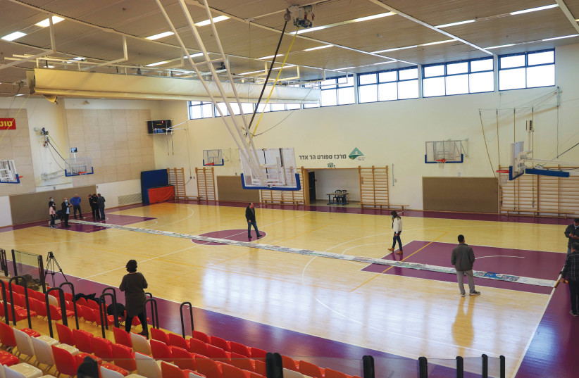  THE ONLY place large enough to measure the megillah was a basketball court. (credit: Rahn Sas)