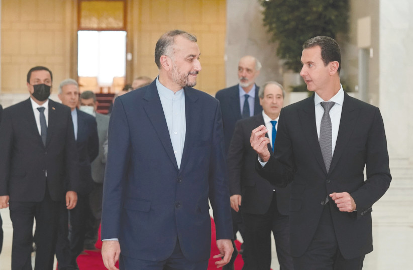  SYRIA’S PRESIDENT Bashar Assad meets with Iranian Foreign Minister Hossein Amirabdollahian in Damascus last year. Syria’s future looks to be in the hands of Assad. (credit: SANA/REUTERS)