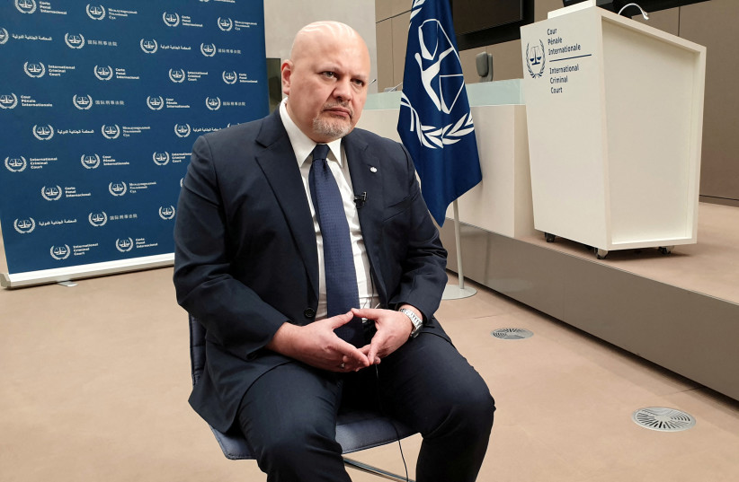  International Criminal Court (ICC) Prosecutor Karim Khan poses during an interview with Reuters at the ICC in The Hague, Netherlands, March 3, 2022.  (credit: REUTERS/CHRISTIAN LEVAUX)