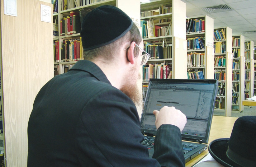  A HAREDI STUDENT works on a computer at the Jerusalem College of Technology. (credit: JCT)