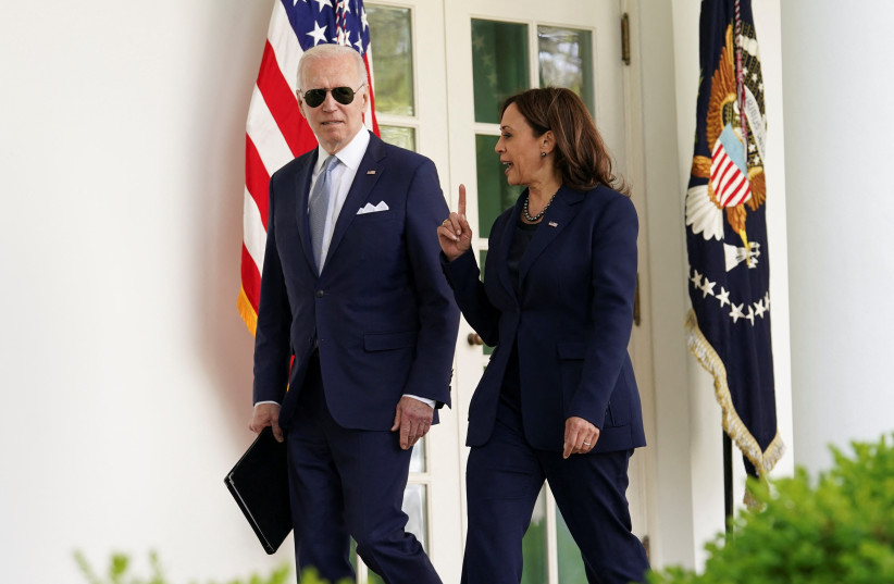  US President Joe Biden and Vice President Kamala Harris speak as they walk into the Oval Office after an event to announce measures by Biden's administration to fight ghost gun crime, at the White House, in Washington, US, April 11, 2022. (credit: REUTERS/KEVIN LAMARQUE)