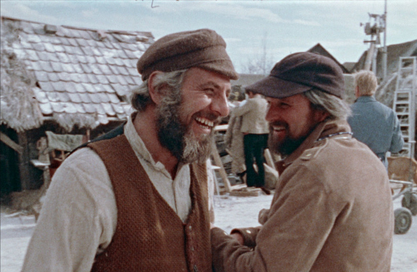  Director Norman Jewison, right, and star Topol as Tevye on the set of the film version of "Fiddler on the Roof."  (photo credit: ZEITGEIST FILMS IN ASSOCIATION WITH KINO LORBER)