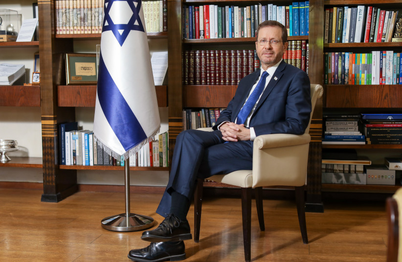  President Isaac Herzog in his office at Beit Hanassi. (credit: MARC ISRAEL SELLEM/THE JERUSALEM POST)